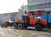 Лесовозный автопоезд на базе шасси Урал 55571 с гидроманипулятором ОМТЛ-70-02
