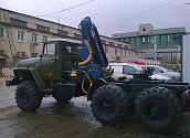 Седельный тягач Урал 4320 с КМУ ИМ-150Т